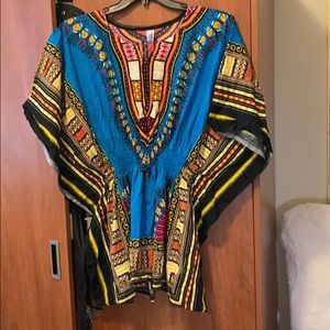 Shirt or can be worn as a dress